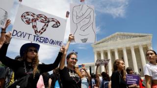 Abortion rights demonstrators hold a rally outside the U.S. Supreme Court in Washington