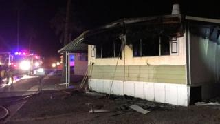The mobile house showing parts that have been burnt