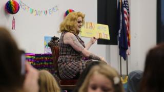 Drag queen Rylee Hunty reading to children