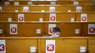 A man studies in the socially distanced reading rooms at the Bodleian Libraries in Oxford on 25 August 2020.