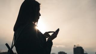 Anonymous girl on a phone