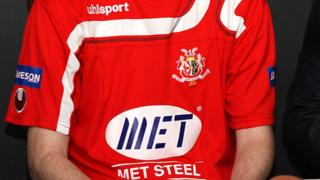 Met Steel logo on Portadown shirt