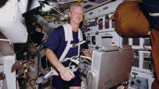 NASA astronaut on a treadmill in space