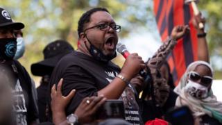 Jacob Blake's father speaks to a crowd gathered at Civic Center Park, in Kenosha, Wisconsin