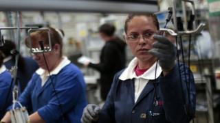 Workers in the auto parts production line of the Bosch factory in San Luis Potosi, Mexico