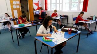 Children at distanced desks in Watlington Primary School