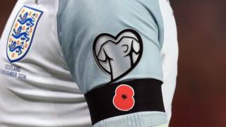 Wayne Rooney wearing a poppy at the World Cup qualifier on Armistice Day
