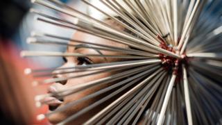 Africa's top shots: 5-11 July 2019 2 A model presents a creation by local designers during a fashion show in Durban, on July 6, 2019.