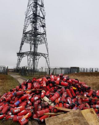 The dumped fire extinguishers