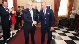 Sir Mark Sedwill welcomes Boris Johnson to Downing Street after he became prime minister in July 2019