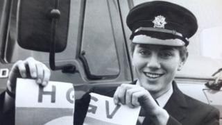 Josephine tearing up her HGV L-plates after qualifying to drive fire engines