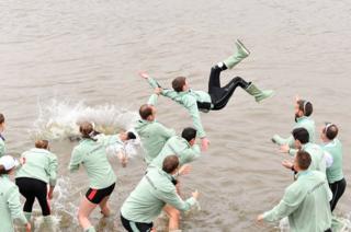 The crews of Cambridge University celebrate