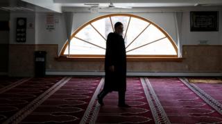 An imam arrives to make the call to pray in New York