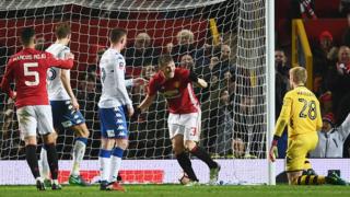 Les joueurs de Manchester United jubilent après un but marqué contre Wigan