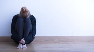 Young person sitting
