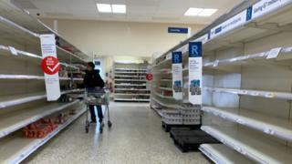 Empty shelves in a UK supermarket