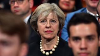 British Prime Minister Theresa May sits in the audience before delivering a speech about Brexit on the first day of the Conservative Party Conference, 2 Oct 2016
