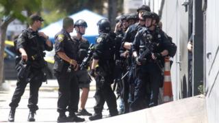 Police outside a United Parcel Service facility in San Francisco, California.