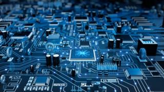 A top angle view of a futuristic circuit board