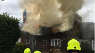 Thatched cottage fire