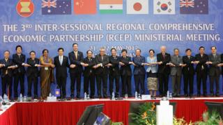 Trade ministers pose for a photo during the 3rd Inter-sessional Regional Comprehensive Economic Partnership (RCEP) Ministerial Meeting in Hanoi, Vietnam May 22, 2017. REUTERS/Kham
