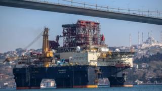 An oil platform ship flagged Bahana Islands passes through the Bosphorus and July 15 Martyrs' Bridge in Istanbul, Turkey.