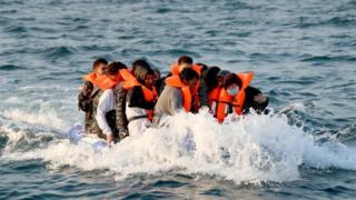 A group of people thought to be migrants crossing the Channel in a small boat headed in the direction of Dover