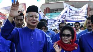 Mantan PM Najib Razak dan istrinya