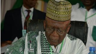Cameroon's Social Democratic Front (SDF) leader Ni John Fru Ndi looks at notes as he addresses his party congress in Bamenda on February 22, 2018