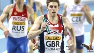 Richard Buck (centre) wins silver in the men's 4x400m relay at the 2012 World Indoor Championships