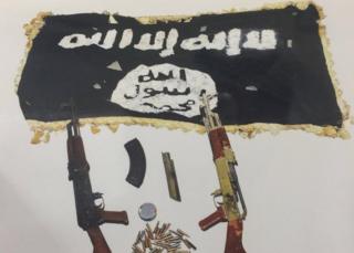 Rifles, ammunition and IS flag allegedly seized by Kuwaiti security forces