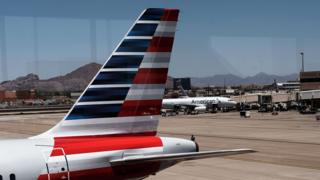 The tail of an American Airlines aircraft