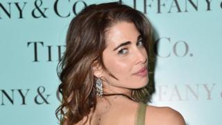 Woman wearing Tiffany earrings