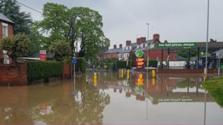 Welshpool flash flooding closes hospital birth centre - BBC News