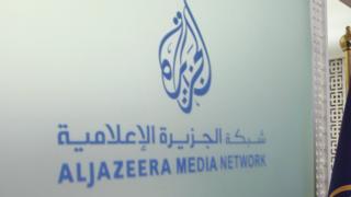The Al Jazeera Media Network logo is seen inside its headquarters in Doha, Qatar June 8, 2017