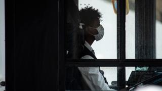 Bus driver wears face mask