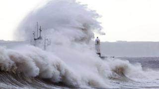 Waves hitting the sea wall in Porthcawl