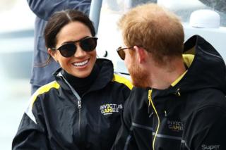 Meghan, the Duchess of Sussex and Prince Harry, Duke of Sussex oversee the course of the Elliott 7 team race on the second day of the Sydney Invictus Games 2018 Sydney Harbor, 21 October 2018 in Sydney, Australia