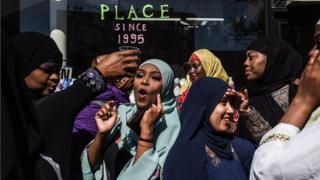 People celebrate in a mosque called the mosque in Taqwa after the prayer of Eid al-Fitr on June 4, 2019 in the Brooklyn district of New York