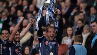 Andrew Davies lifting the Scottish League cup