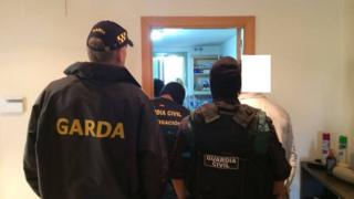 Police carrying out searches in Spain