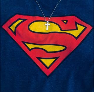 A Superman t-shirt with a crucifix necklace hanging down