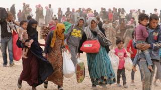 Syrian refugees waiting to enter Jordan in May 2016