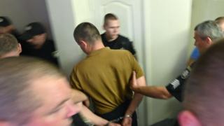 One of the two suspects, Volodymyr Petrovets (centre), appears in court in Kiev, Ukraine. Photo: 4 June 2019