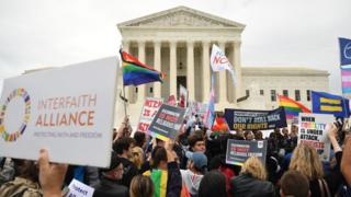 Demonstrators in favour of LGBT rights rally outside the US Supreme Court in Washington, DC, 8 October, 2019