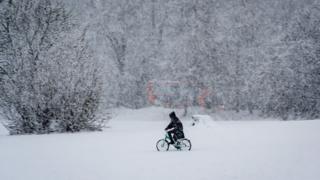 Cyclist in the snow