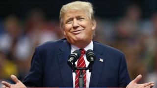Donald Trump speaking at a campaign event in 2015