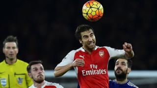 Arsenal's French midfielder Mathieu Flamini wins a header during the English Premier League football match between Arsenal and Chelsea at the Emirates Stadium in London on January 24, 2016