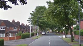 Hempstalls Lane at the junction with Beattie Avenue in Newcastle-under-Lyme, Staffordshire.