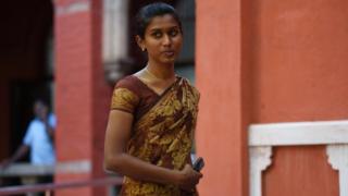 Indian policewoman K Prithika Yashini, 25, leaves after a judgement cleared legal hurdles allowing her to become India"s first transgender Sub Inspector of Police at the Madras High Court on November 6, 2015.